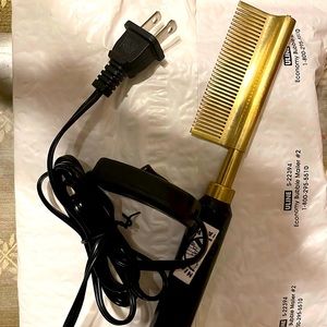 Electric straightening comb